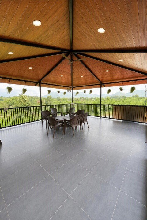 Gazebo with seating and hill views